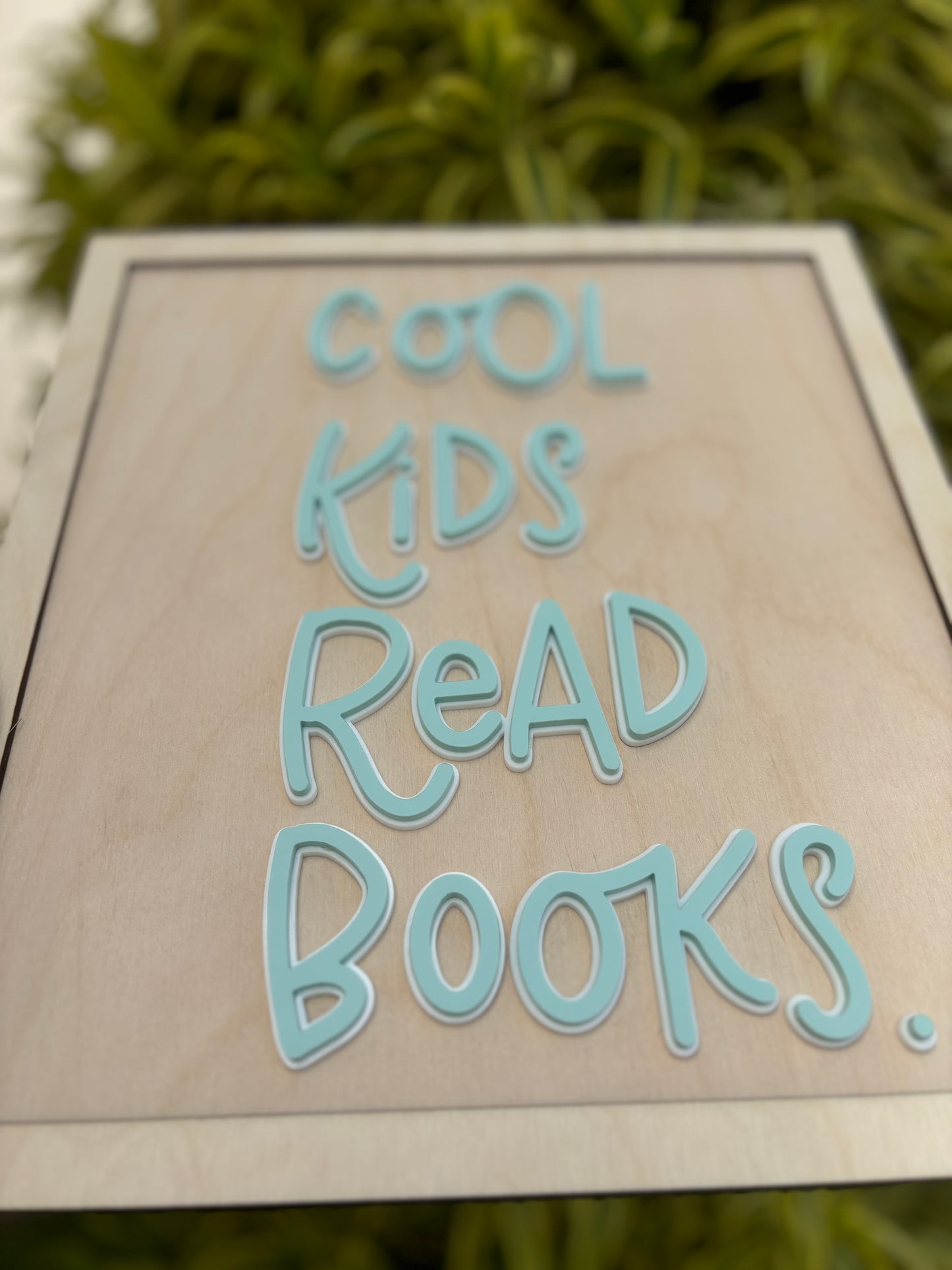 Cool kids read books sign