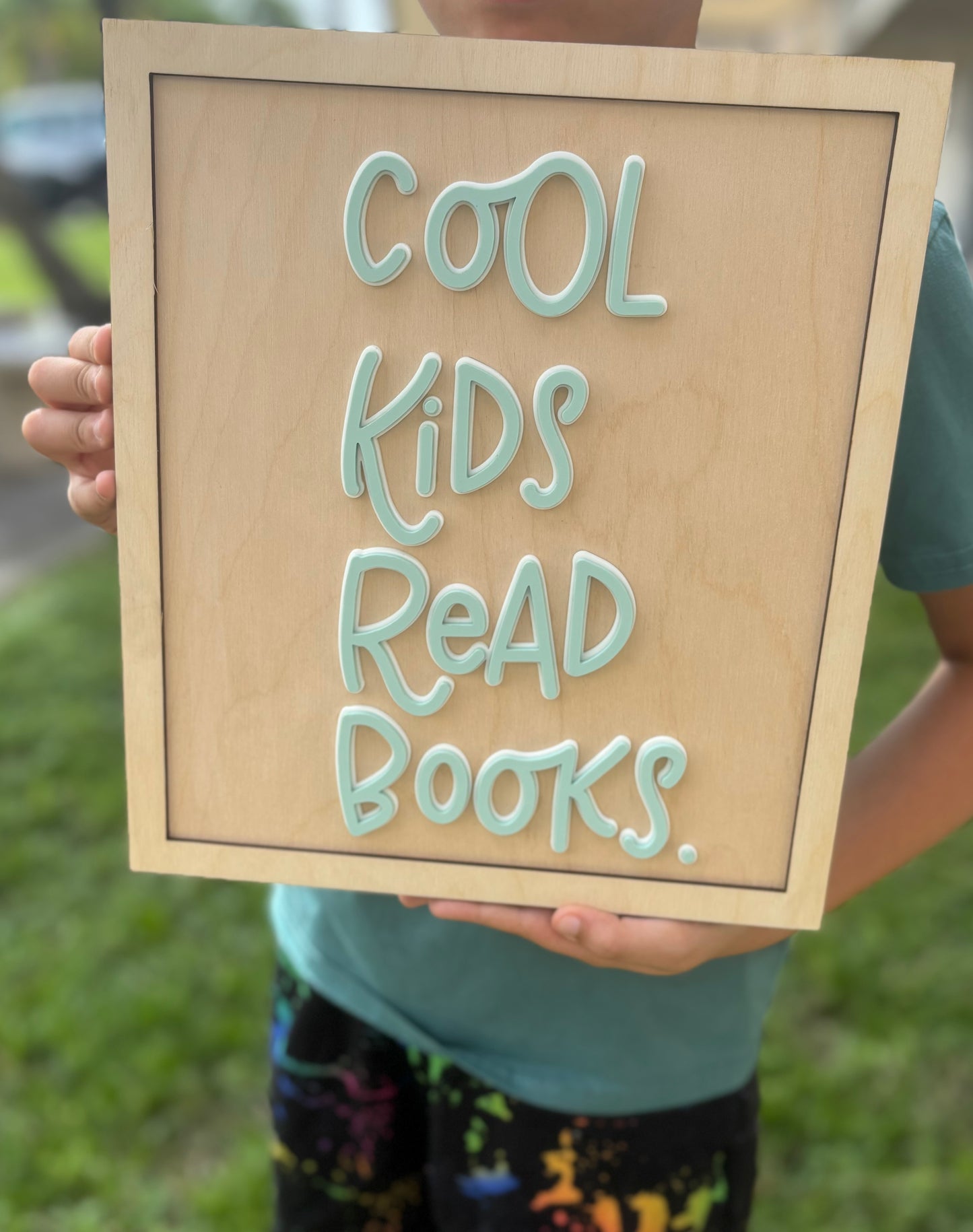 Cool kids read books sign