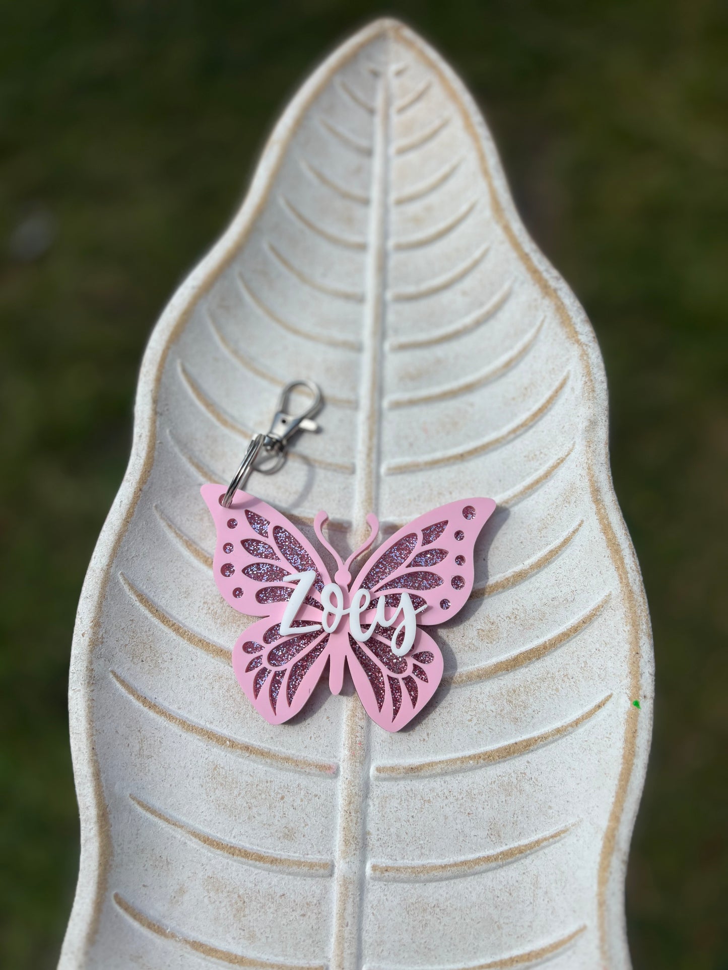 Pink glitter butterfly backpack tag