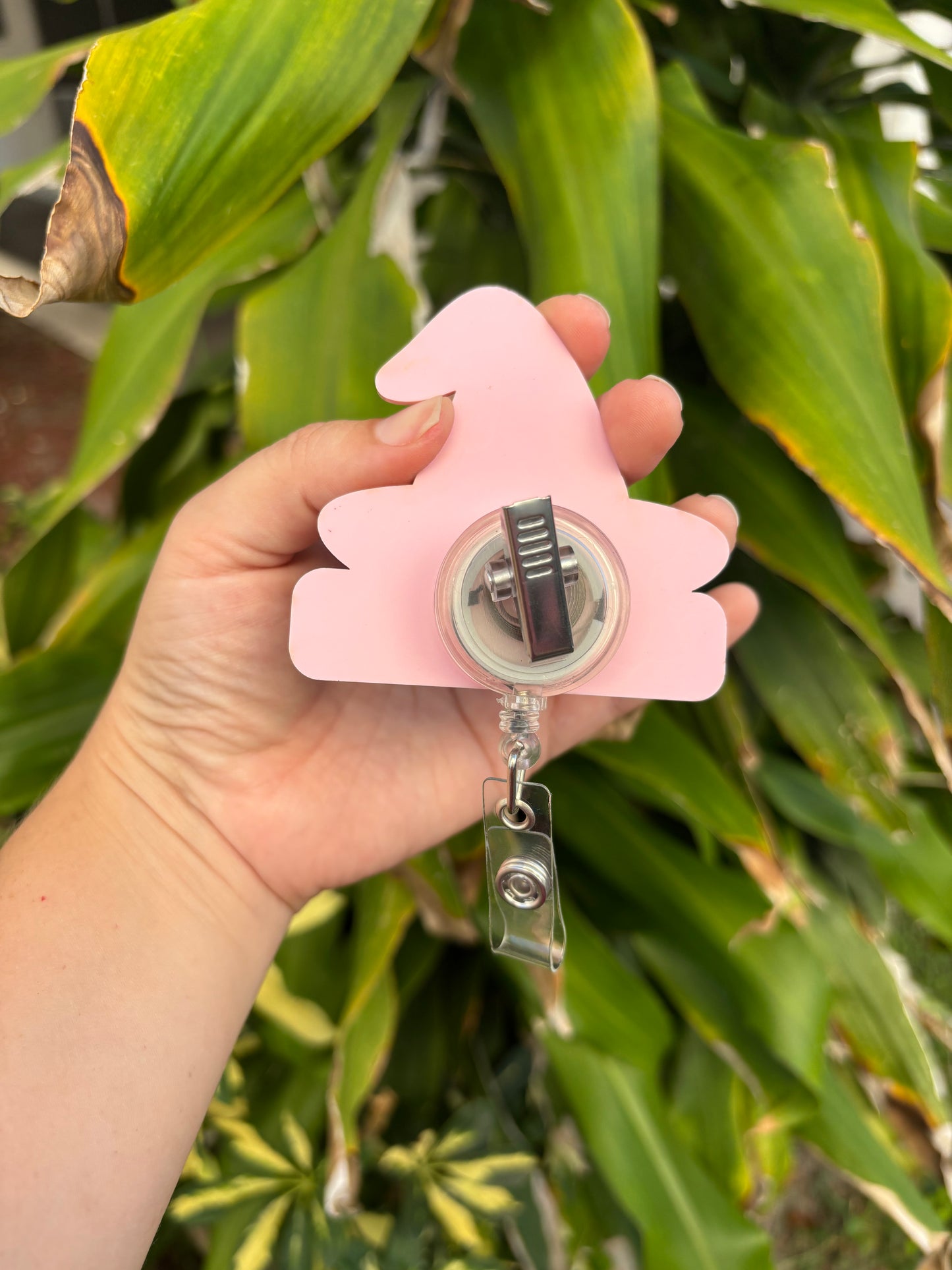 Witch hat badge reel