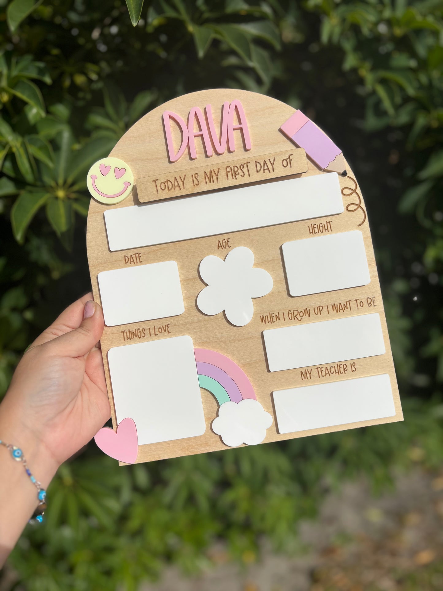 Pastel rainbow back to school board
