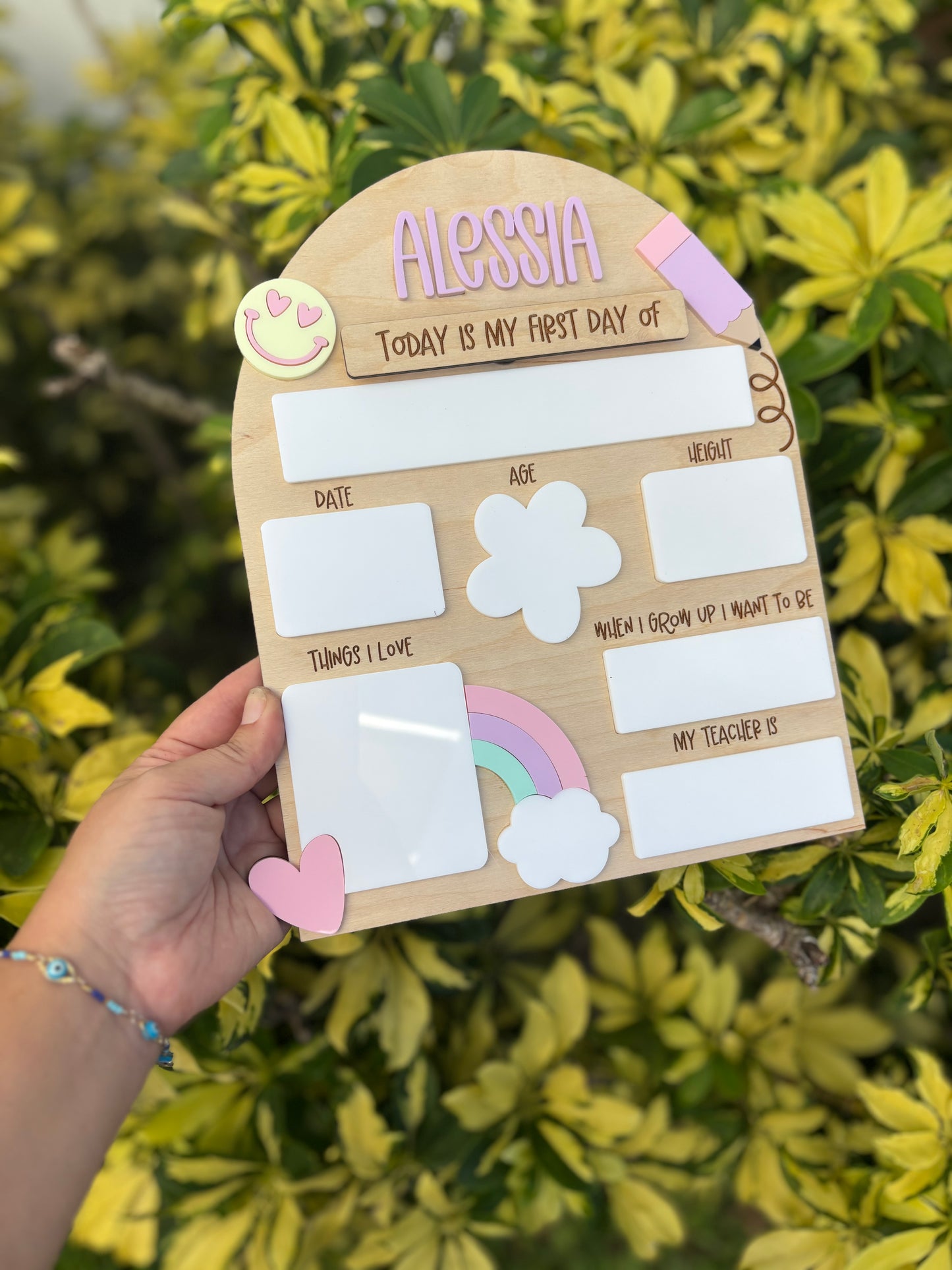 Pastel rainbow back to school board