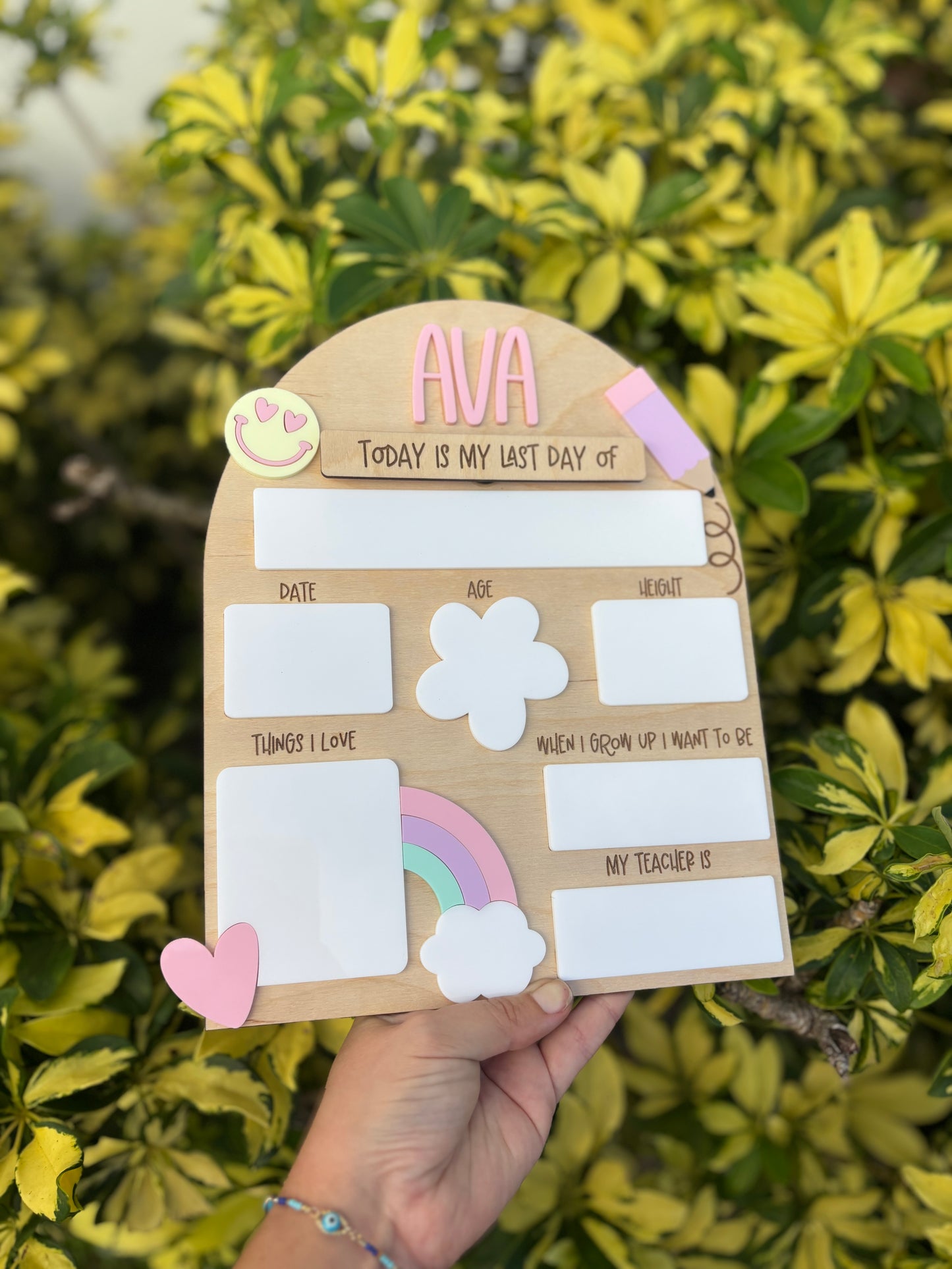 Pastel rainbow back to school board