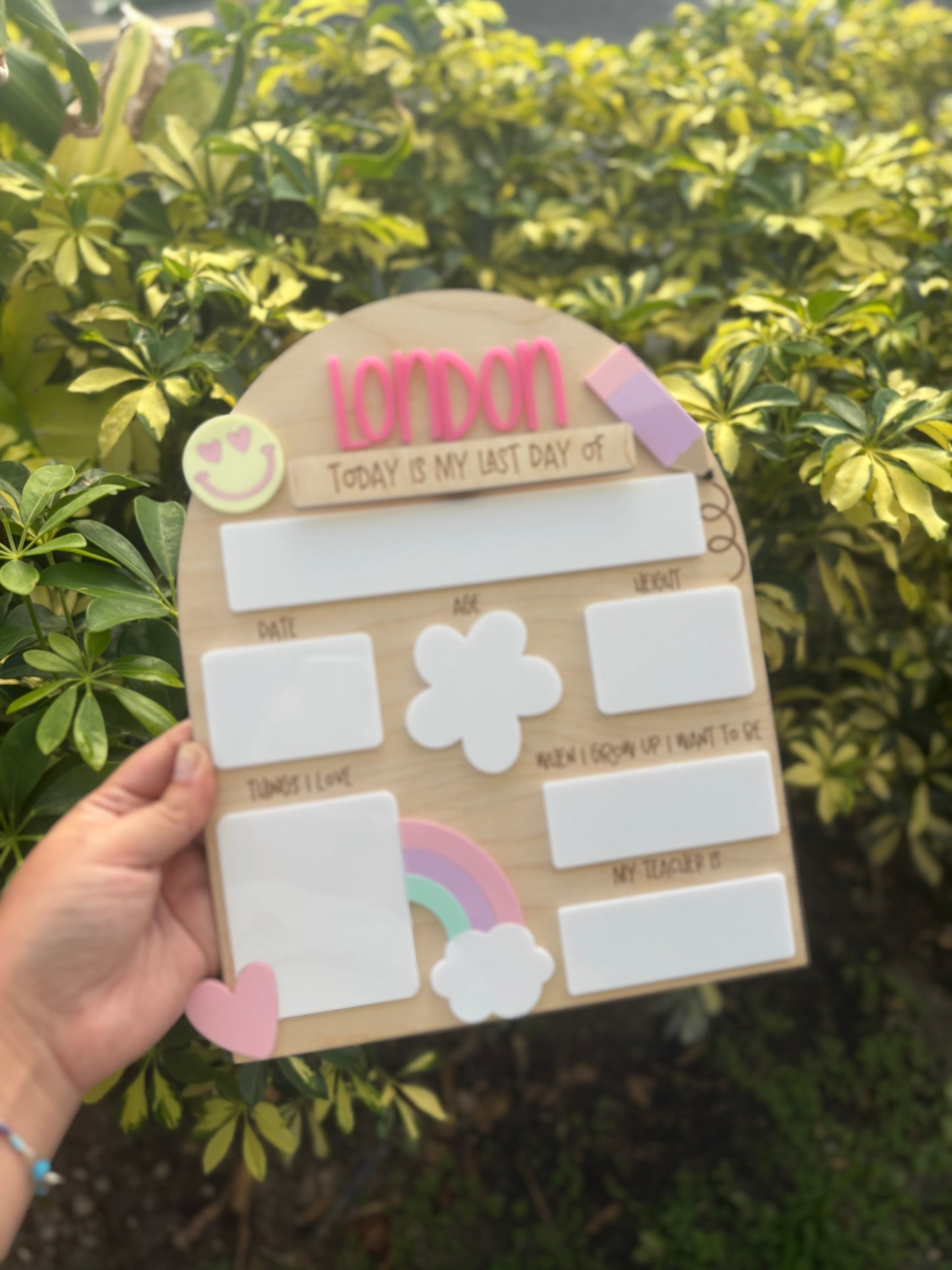 Pastel rainbow back to school board